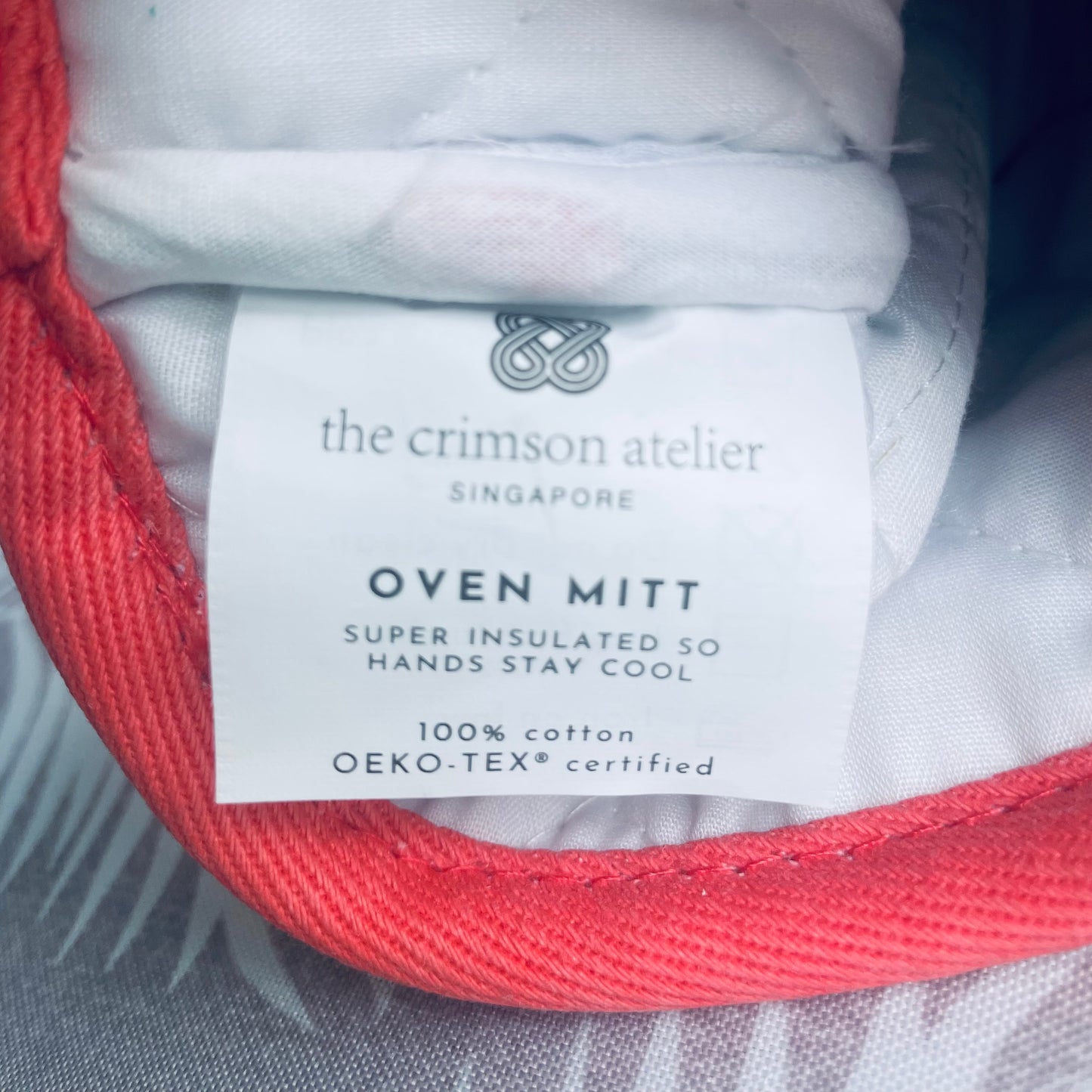 The Crimson Atelier Oven Mitt Wash Label