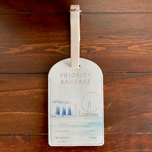 Singapore Airways Luggage Tag that states "Priority Baggage"