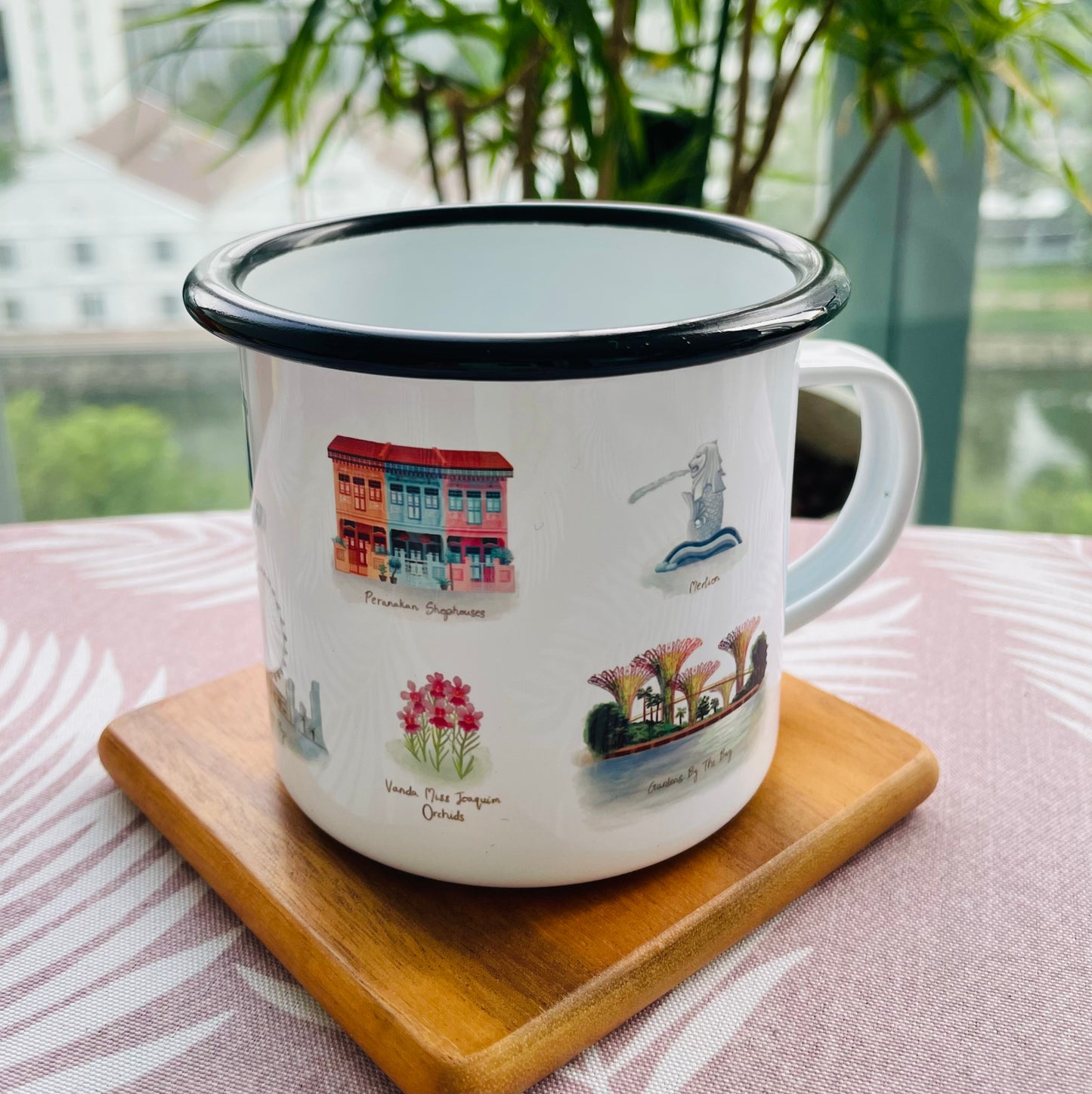 Singapore Icons Enamel Mug featuring various Singapore icons